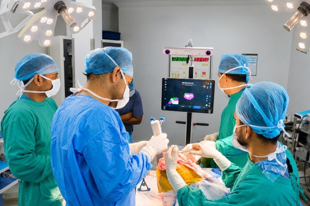 Orthopaedic surgical team performing total knee replacement surgery in the operation theatre at Sama Hospital, South Delhi